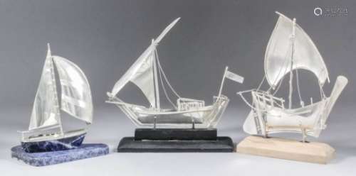 A 20th Century silvery metal and lapis lazuli model of a yacht, 6ins x 7ins high (stamped 