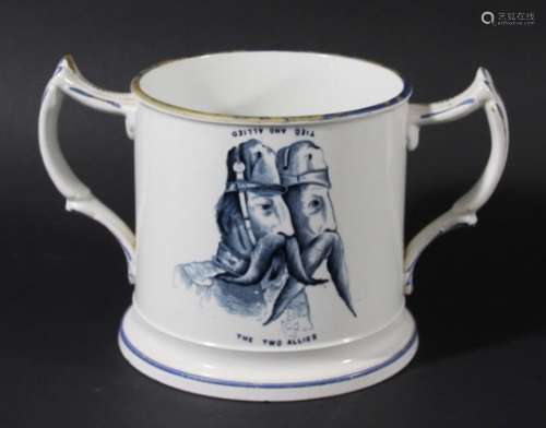 PEARLWARE LOVING CUP, circa 1860, blue transfer printed with reversible, satirical scenes titled The