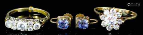 Two 9ct gold mounted and cubic zirconia rings, one of flowerhead pattern (size S and V), and a