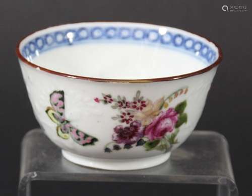 CHINESE TEA BOWL, Qianlong, painted with floral sprays and butterflies on a bianco sopra bianco