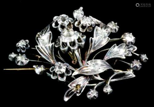 A late 19th Century gold and silver coloured metal mounted diamond brooch of floral and leaf