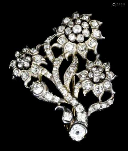 A 19th Century gold coloured metal mounted all diamond set brooch in the form of three sun