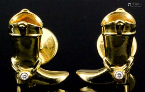 A pair of 18ct gold and diamond cufflinks by Tiffany & Co. modelled in the form of a pair of