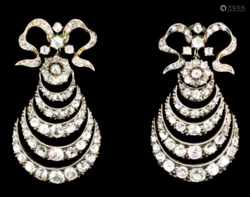 A pair of late 19th / early 20th Century gold and silvery coloured metal mounted all diamond