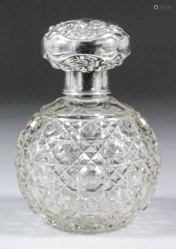 A George V silver mounted hobnail cut glass spherical scent bottle, the silver mount embossed in the