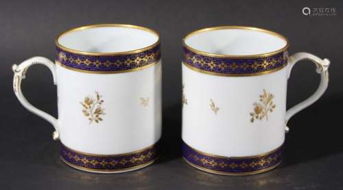 PAIR OF BARR, WORCESTER, MUGS, early 19th century, with gilt sprigs between blue and gilt borders,