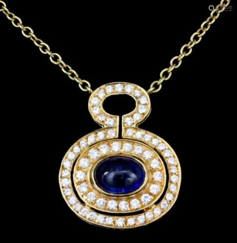 A 20th Century 18ct gold mounted sapphire and diamond pendant, set with central oval cabochon