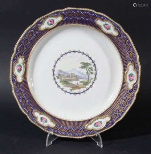 DERBY PLATE, late 18th century, by Zachariah Boreman, painted with a central landscape inside a blue