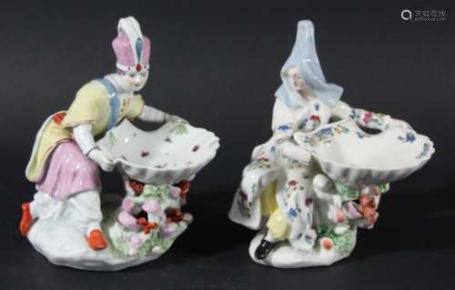 PAIR OF BOW FIGURAL SWEETMEAT DISHES OR SALTS, mid 18th century, modelled as a Levantine couple