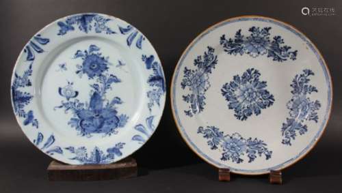 DUTCH DELFT CHARGER, mid 18th century, blue painted with a large flower inside a foliate border,