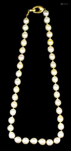A single strand of baroque pearls, 440mm overall, and a Liberty's leather lined cloth travelling