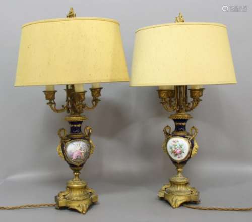 PAIR OF FRENCH ORMOLU AND PORCELAIN LAMPS, 19th century, the Sevres style bodies with painted,