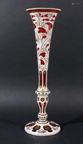 BOHEMIAN GLASS VASE, white cut through to ruby, with painted and gilt floral decoration, height