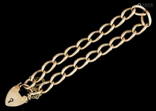 A 9ct gold oval link bracelet with heart pattern clasp (gross weight 20 grammes)
