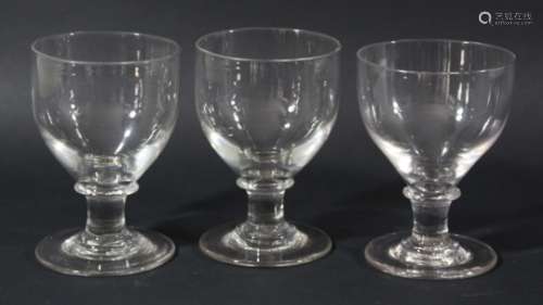 COLLECTION OF TWELVE GLASS RUMMERS, mainly 19th century, with rounded bowls and knopped stems (12)