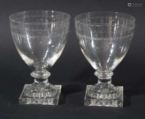 PAIR OF RUMMERS, circa 1800, the rounded bowls with polished oval and engraved star decoration on