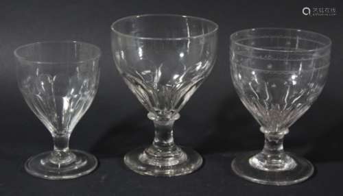 THREE RUMMERS, circa 1800, with moulded bowls, one with a star engraved border, 11.5cm-13.5cm (3)