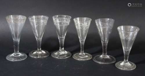GROUP OF SIX GLASSES, late 18th and early 19th century, each with engraved, drawn trumpet bowls