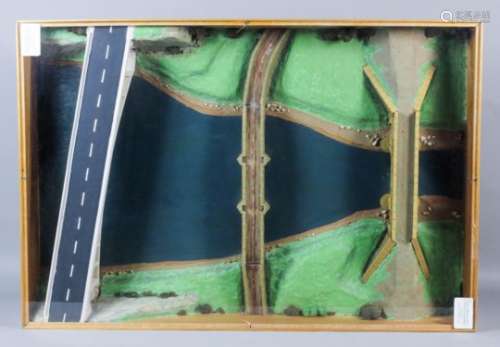 A cased wood, composition and painted scale model of three road bridges over the River Medway,