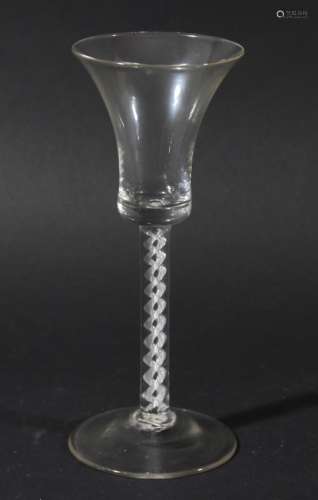 GEORGIAN WINE GLASS, the bell shaped bowl above a single series air twist stem with two spiral