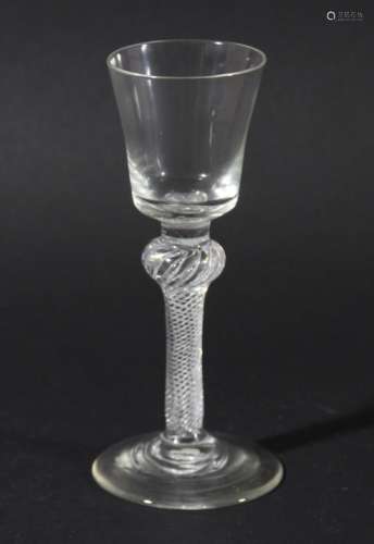 GEORGIAN WINE GLASS, the bucket shaped bowl above a multiple spiral air twist stem with shoulder
