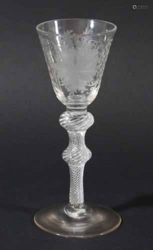 GEORGIAN WINE GLASS, the rounded funnel bowl with engraved vine leaves and polished grapes on a
