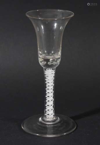 WINE GLASS, circa 1760, the bell shaped bowls with bead inclusion base on a double series opaque