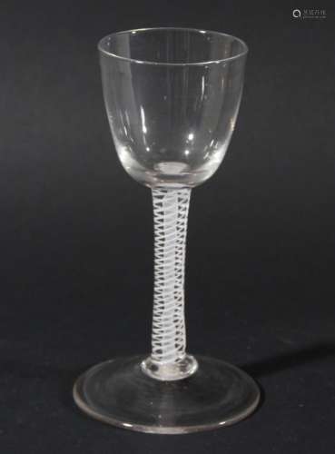 WINE GLASS, circa 1770, the rounded bowl on a double series opaque twist stem with a central gauze