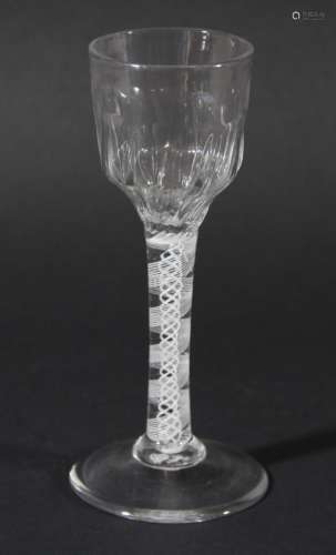 WINE GLASS, the ogee bowl with moulded base on a double series opaque twist stem of four spiral