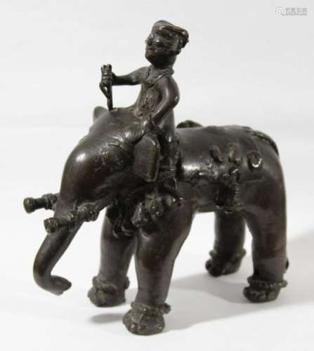INDIAN BRONZE FIGURE OF A MAHOUT ON ELEPHANT BACK, 19th century, with chained ankles and shortened
