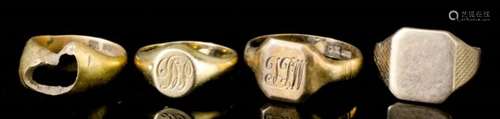 A George V 18ct gold signet ring, the oval face initialled 