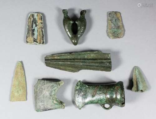 A collection of Bronze Age artefacts, comprising - socketed axe of two piece construction, cutting