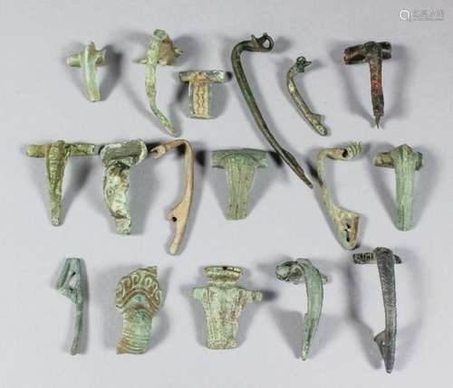 A collection of seventeen Roman copper alloy and bronze brooches (fibulae), .75in to 2.75ins,