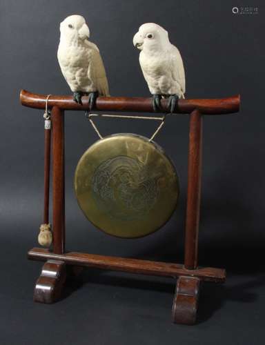 PAIR OF JAPANESE IVORY LOVEBIRDS, late 19th century, with mother of pearl eyes and bronze feet,