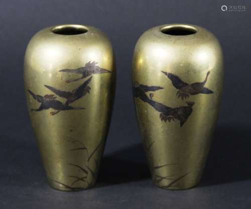 PAIR OF JAPANESE BRASS AND INLAID VASES, of ovoid form, decorated with birds in flight over grasses,