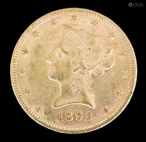 A USA 1892 gold Coronet Eagle (weight 16.7 grammes - fair/fine with slight scuff marks)