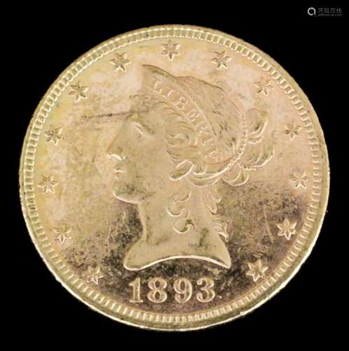 A USA 1893 gold Coronet Eagle (weight 16.7 grammes - fine with slight scuff marks)