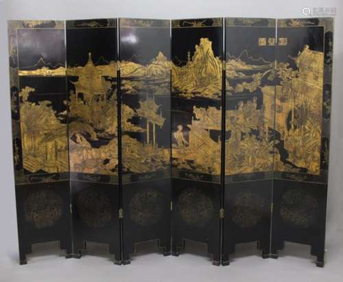 CHINESE BLACK LACQUERED AND GILT SIX FOLD SCREEN, 19th century, gilded with a continuous scene of