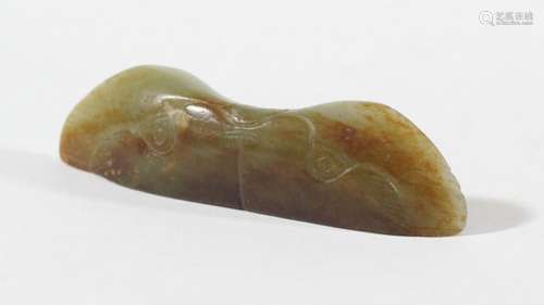 CHINESE GREEN AND RUSSET JADE MOUNT, perhaps 18th century, of slender form carved with the head of a