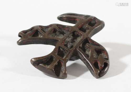 SOUTH EAST ASIAN BRONZE SEAL, perhaps Han Dynasty Chinese, modelled as a stylised bird in flight,