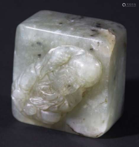 CHINESE GREY GREEN JADE SEAL, of square form with a carving of Shoulao to the top and a six