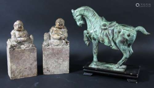 CHINESE TANG STYLE BRONZE HORSE, standing on a rectangular plinth with an inscription beneath, green