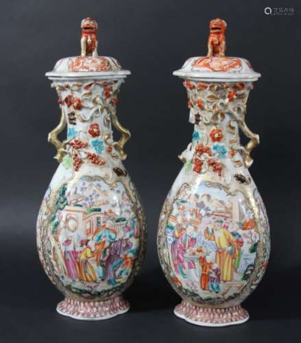 PAIR OF CHINESE EXPORT VASES AND COVERS, 19th century, of flattened ovoid form, enamelled with