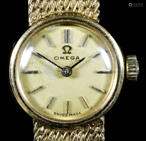 A lady's Omega 18ct gold cased manual wind wristwatch, the gold dial with gold numeral batons,