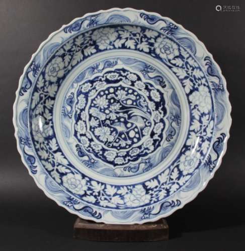 CHINESE MING STYLE BLUE AND WHITE CHARGER, a central cartouche of birds and lotus inside waves, a