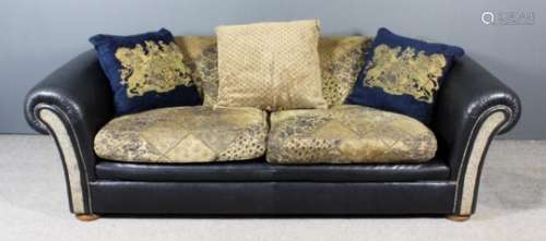 A modern Tetrad Chesterfield settee of large proportions, upholstered in mushroom and navy