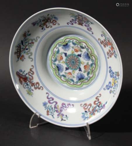 CHINESE OGEE SHAPED DOUCAI BOWL, the centre with a ring of flowers inside a green border, the