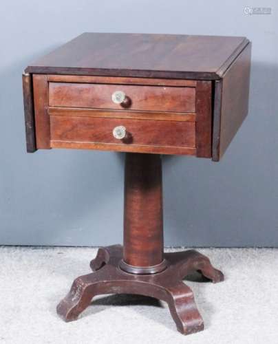 A Victorian mahogany rectangular drop leaf work table with plain rectangular leaves, fitted two