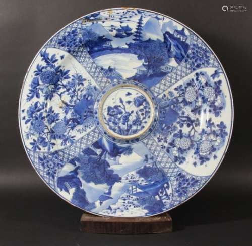 CHINESE BLUE AND WHITE CHARGER OR EWER STAND, possibly Kangxi, a central floral scene in a raised