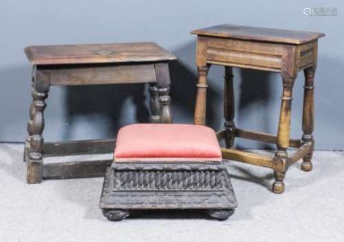 An oak joint stool of 17th Century design, with moulded rails, on turned legs and plain